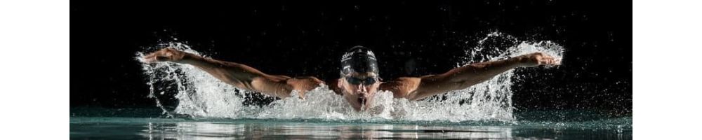 Swimming goggles and hats. Children's suits
